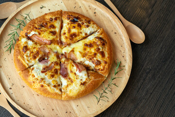 Delicious fresh pizza served on wooden plate, Hot Homemade Pizza Ready to serve.