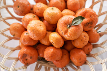 Pile of juicy ripe orange in basket. fresh oranges organic fruit food footage background