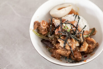Go Jhu Jang Fire Chicken, fried chicken pieces with onion, garlic, go chu jang, seaweed, rice, egg - obrazy, fototapety, plakaty
