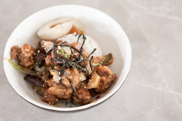Go Jhu Jang Fire Chicken, fried chicken pieces with onion, garlic, go chu jang, seaweed, rice, egg