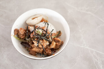 Go Jhu Jang Fire Chicken, fried chicken pieces with onion, garlic, go chu jang, seaweed, rice, egg