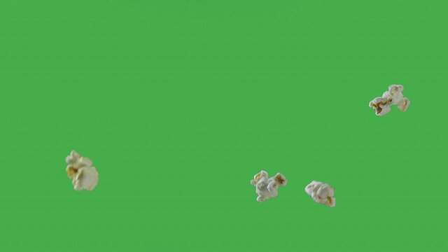 Popping Popcorn Flying and Falling Isolated on ChromaKey Background