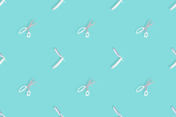 Seamless pattern on the theme of the barber shop. Background from a straight razor and hairdressing...