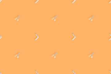 Seamless pattern on the theme of the barber shop. Background from a straight razor and hairdressing...