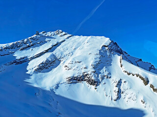 Snowy alpine mountain peak Sex Rouge (or Scex Rouge) located in a mountain massif Les Diablerets...