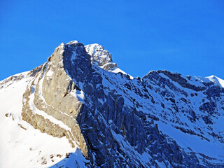 Snowy alpine mountain peak Oldenhorn (Oldehore or Becca d'Audon) located in a mountain massif Les...