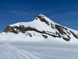 Snowy alpine mountain peak Oldenhorn (Oldehore or Becca d'Audon) located in a mountain massif Les...