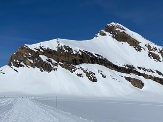Snowy alpine mountain peak Oldenhorn (Oldehore or Becca d'Audon) located in a mountain massif Les...