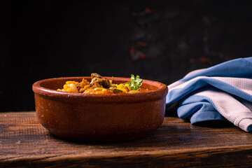 cazuela de locro traditional food and typical Argentine flag