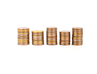 Row of metal coins isolated on white background. Investments, deposits, profits. Copy space.