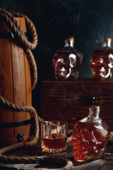 Bottles in the form of a skull with strong alcohol, rum, pirate mood.