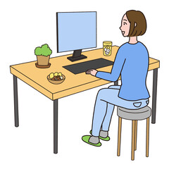 デスクでお酒を飲みながらパソコン作業をしている女性