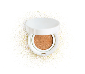 Foundation cushion powder with puff. Cosmetic face powder in the golden glitter circle isolated on white background