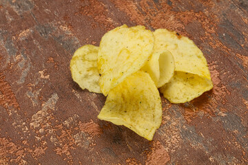 Natural potato salted chips heap