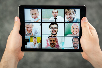 Online business conference screen in hands new normal