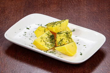 Boiled potato with green dill