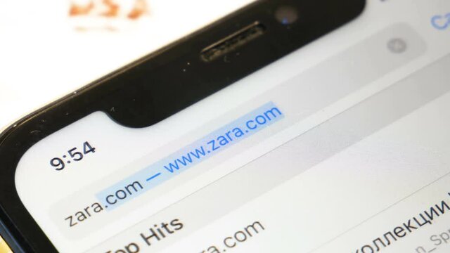 zara web site with new modern collection in smartphone, closeup