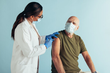 Senior man getting covid immunity vaccine