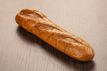 Crust tasty baguette over board