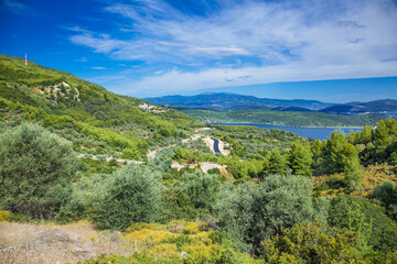 Panoramic view from above on the forests of Evia island  with the sea . Evia . Greece.