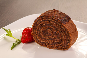 Chocolate roll cake served strawberry
