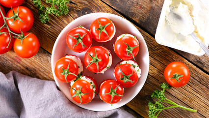cherry tomato garnish with cream cheese and herbs