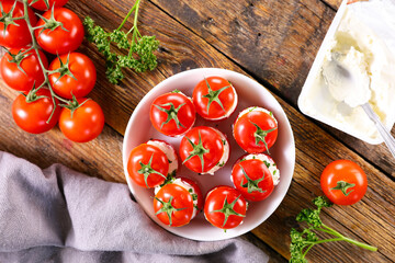 cherry tomato garnish with cream cheese and herbs