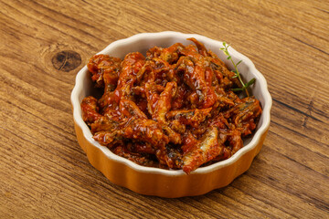 Canned anchovy in tomato sauce