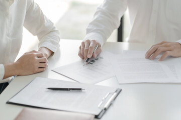 home loan insurance. .Real estate broker and client  sign contract insurance agreement document....