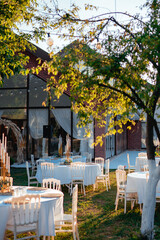 decorated wedding hall table at sunset