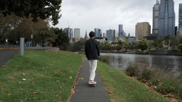 Teen Skateboarder Skates Down Yarra River, Melbourne, SLOW MOTION
