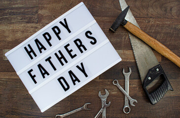 Happy Father´s Day background with Various tools on a wooden background, Top view.