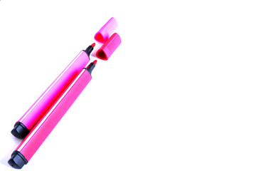 Colored markers on a white background. Good for the background.