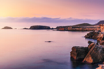 Fototapeta na wymiar Colores del amanecer en la costa