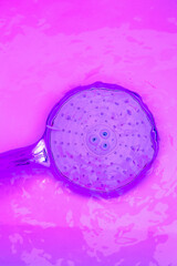 Minimal vertical wallpaper. Shower in purple underwater