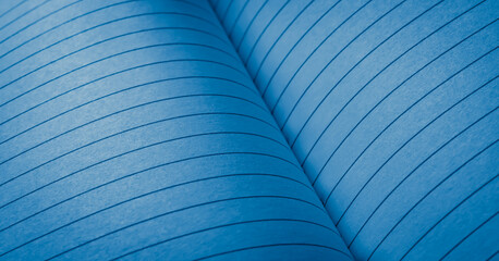 blue pages from a lined notebook. background