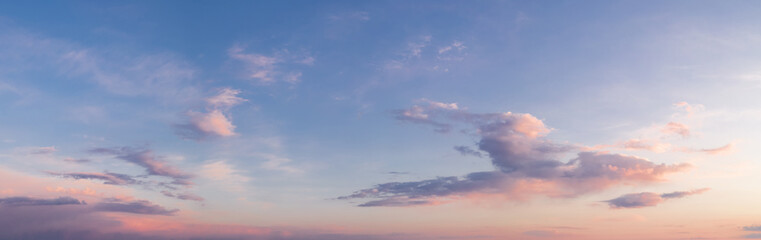 Naklejka na ściany i meble panorama of a bright sky at sunset or sunrise