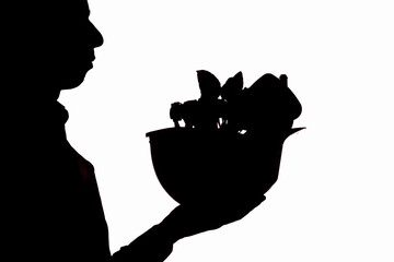 silhouette man profile holding helmet on white isolated background with plants growing inside and figure of house, concept of green building