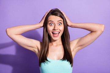 Fototapeta premium Photo of surprised young lady hold hands head unexpected shopping sale isolated on purple color background