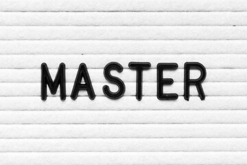 Letter in word master on white felt board background