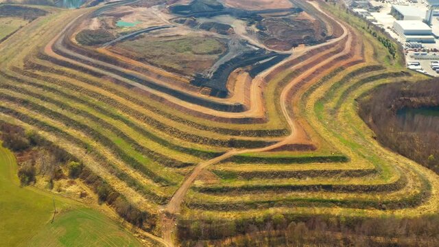 Aerial view of recultivated landscape after mining. Dump from old underground mine. Climate change concept. Back to nature. Western Bohemia, Czech Republic, European Union.
