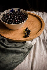 Fototapeta na wymiar Blackcurrants in a bowl still life