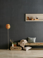 Modern decorative dark grey stone wall background with wooden bench orange lamp blanket and pillow home design, interior still life. © UnitedPhotoStudio