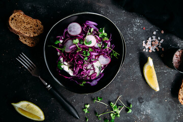 Purple cabbage salad with radish and cucumber