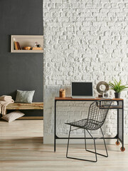 Modern room working table and chair with computer close up style, grey stone wall background with niche and wooden decorative bench.