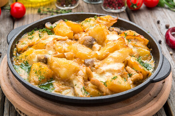 Tyrolean fried potatoes with meat, bacon and mushrooms, Tyrolean Groestl