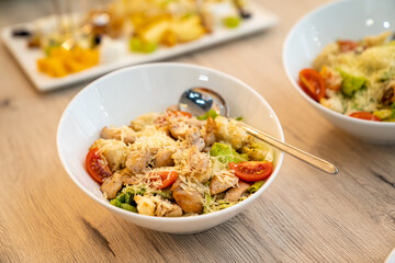 Catering. serving the table with salads for the holiday. ordering ready meals and serving banquets. .