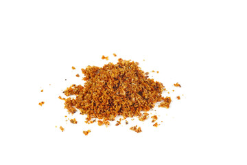 Grated nutmeg isolated on a white background closeup