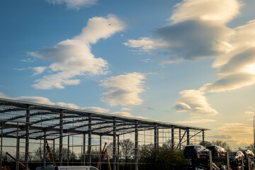 Fototapeta premium Industrial distribution warehouse construction frame in england uk