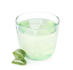 Fresh aloe drink in glass and leaf slices on white background
